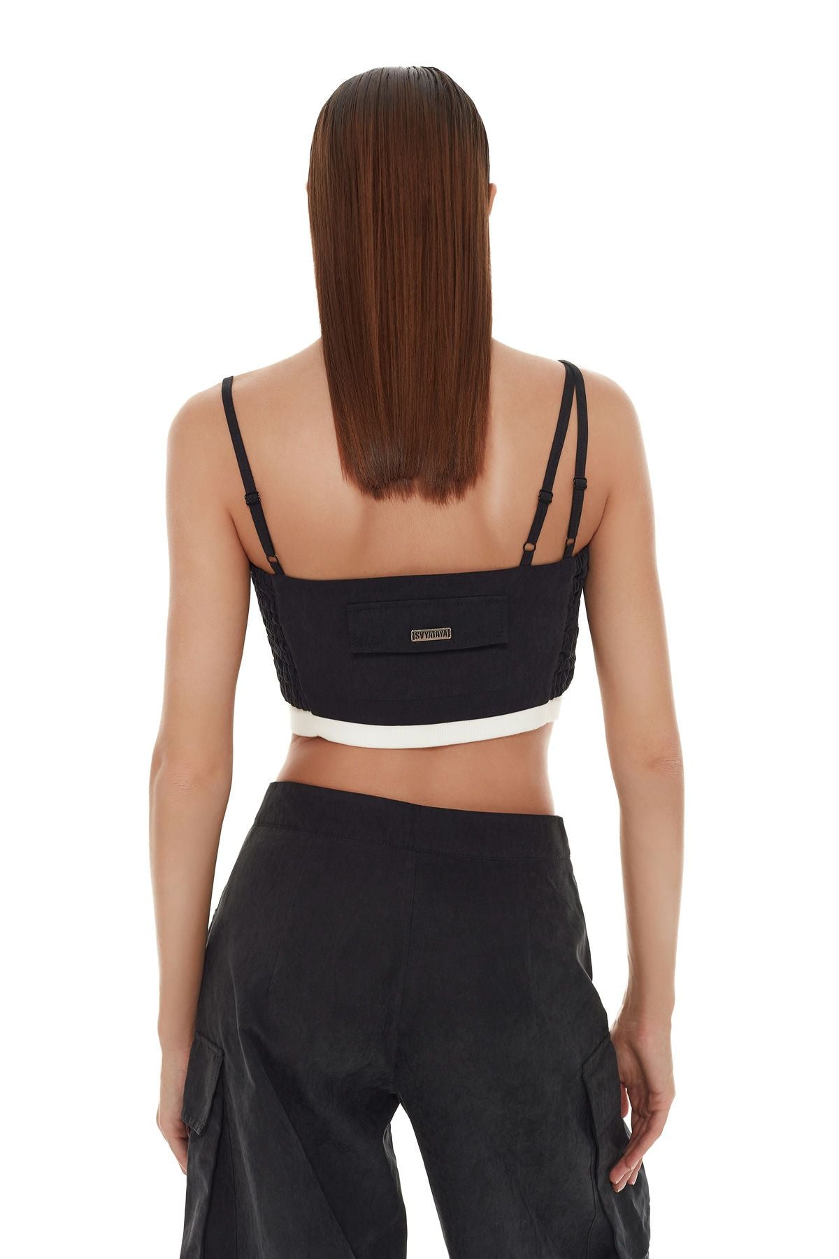 Elegant black top with refined contrasting detailing