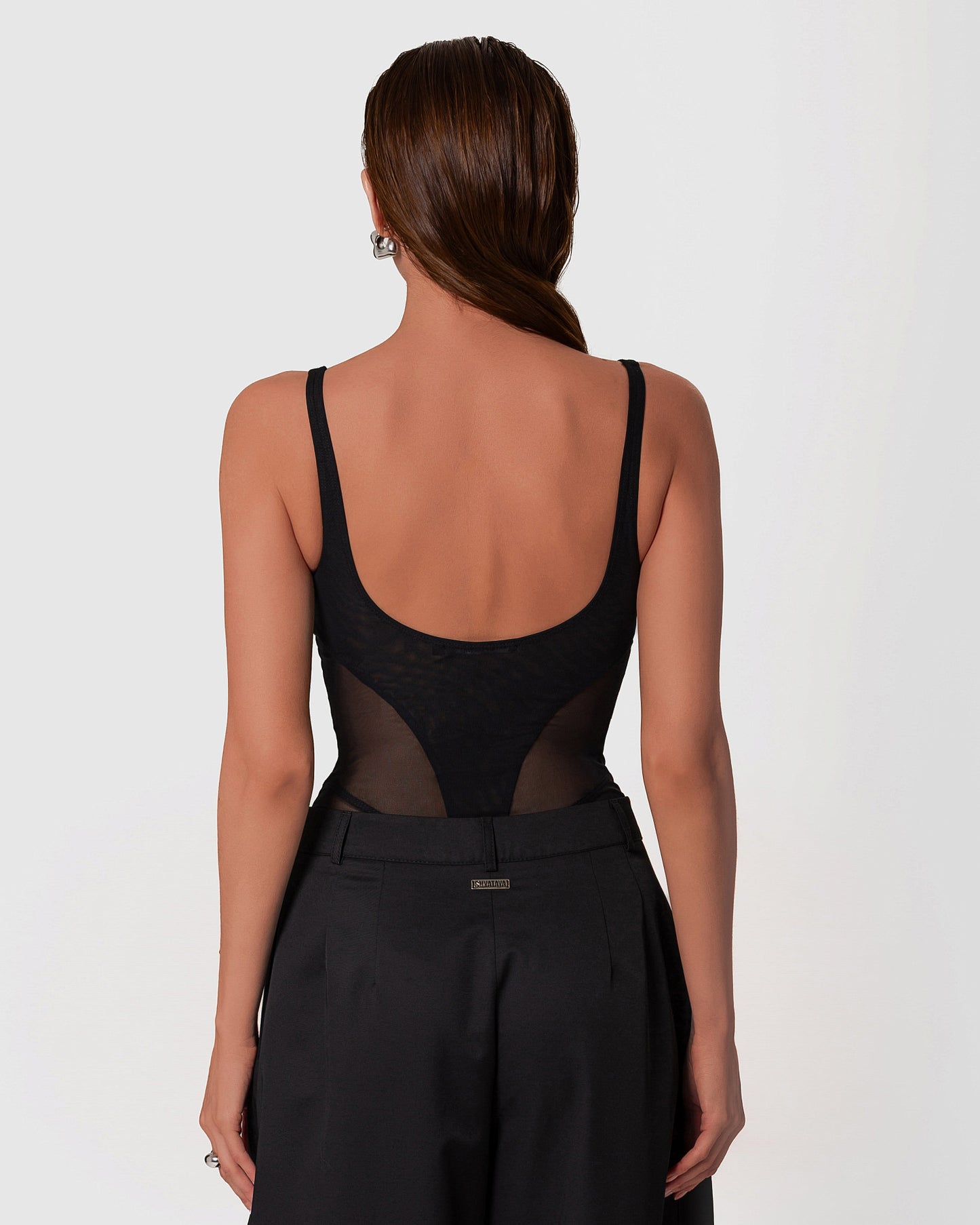 Luxurious mesh bodysuit with sculpted detailing