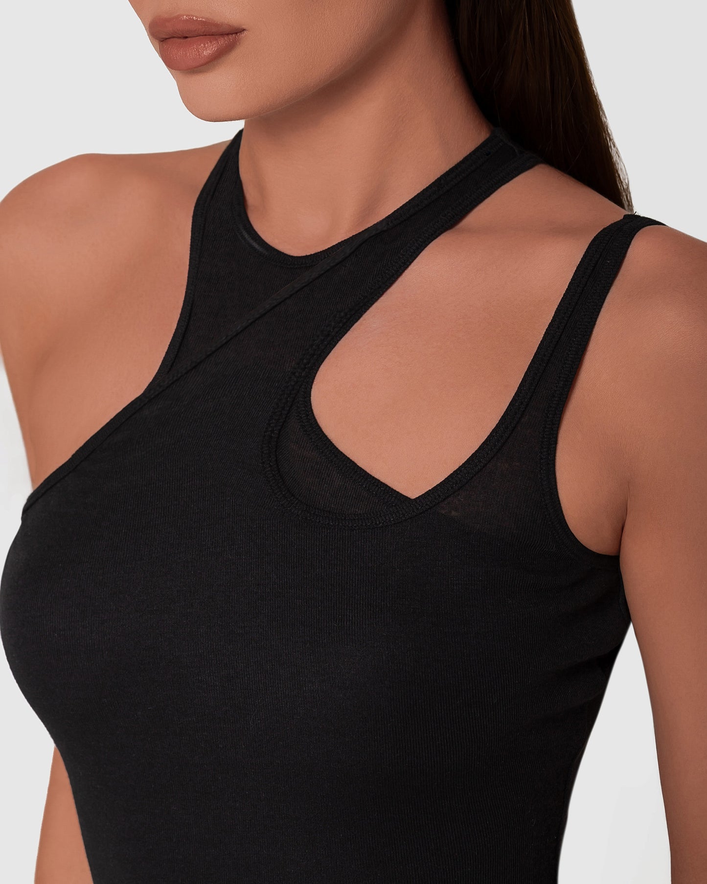 Elegant bodysuit with subtly asymmetrical straps