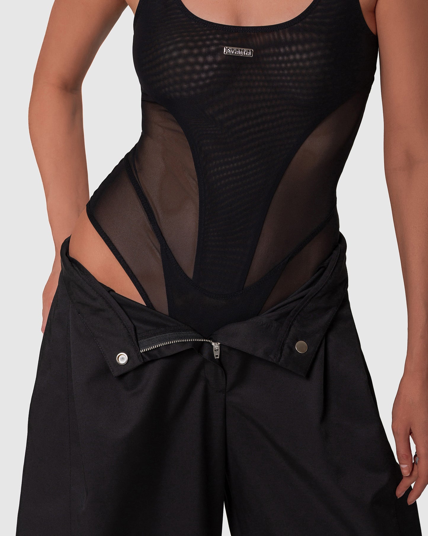 Luxurious mesh bodysuit with sculpted detailing