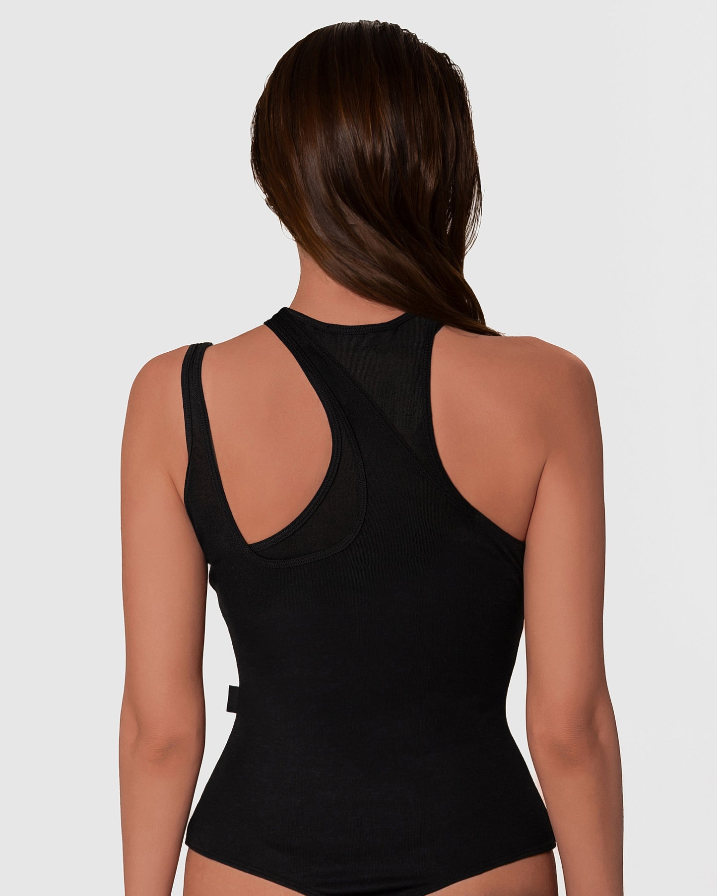 Elegant bodysuit with subtly asymmetrical straps